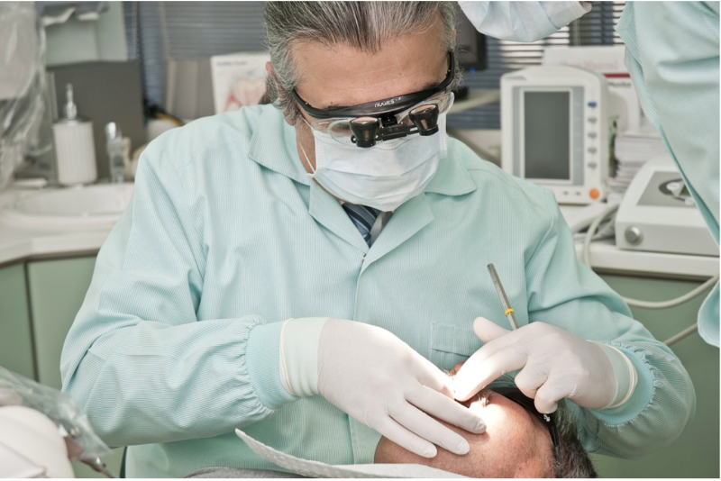 dentist performing procedure